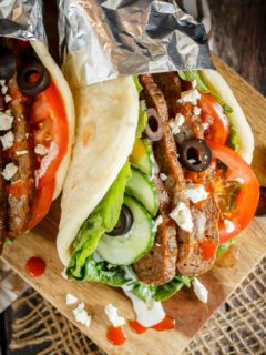 These homemade donairs (gyros) are so easy to make and the whole family will love them! Serve them with flatbread and lots of toppings for a fun and easy meal!