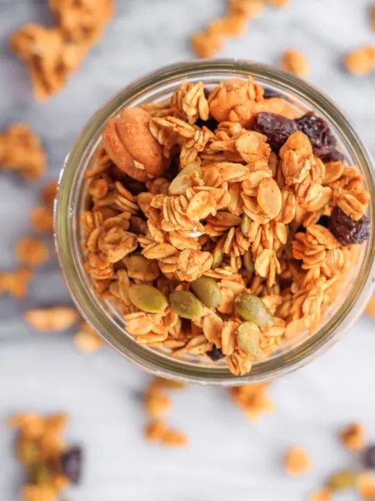 This homemade pumpkin spice granola is so easy to make - pair it with some yogurt for the perfect healthy breakfast or snack!