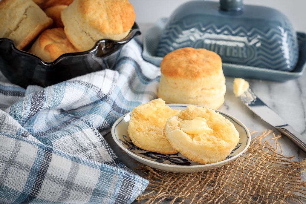 These homemade cream biscuits use only 4 ingredients, take just minutes to mix up, and result in wonderfully flaky homemade biscuits you will love! The perfect easy side dish for any meal, or even for breakfast warmed up with some jam!