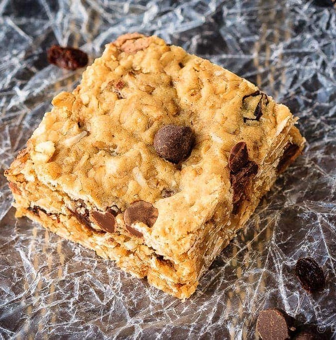 These chewy oatmeal raisin chocolate chip bars are so easy to make and everyone will love them. Your favourite cookie in bar form!