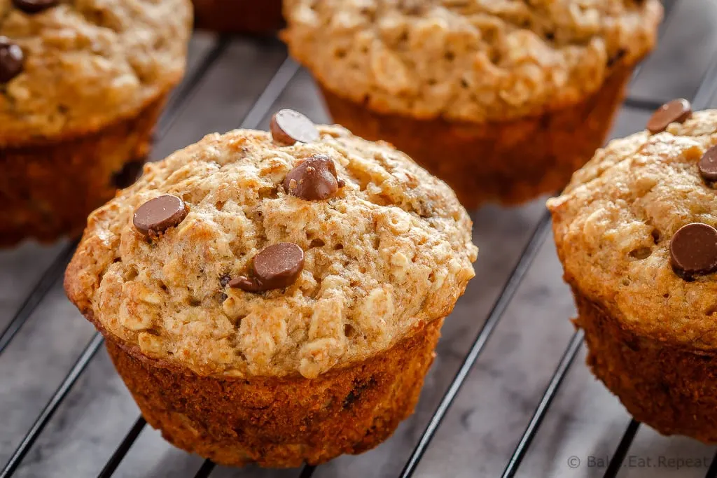 These chocolate chip banana oatmeal muffins are super easy to make. Filled with oats, whole wheat flour, and bananas - they're healthy enough for breakfast!