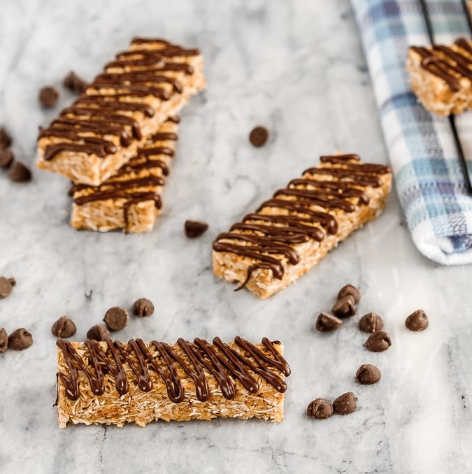 These homemade chewy coconut granola bars are quick and easy to make and are perfect to have on hand for tucking into the kids lunch boxes!