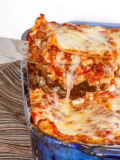 Homemade lasagna is one of my family's favourite meals. A thick and chunky meat sauce and lots of cheese, layered with tender pasta - perfect comfort food!