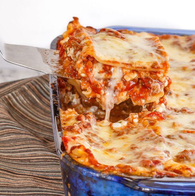 Homemade lasagna is one of my family's favourite meals. A thick and chunky meat sauce and lots of cheese, layered with tender pasta - perfect comfort food!