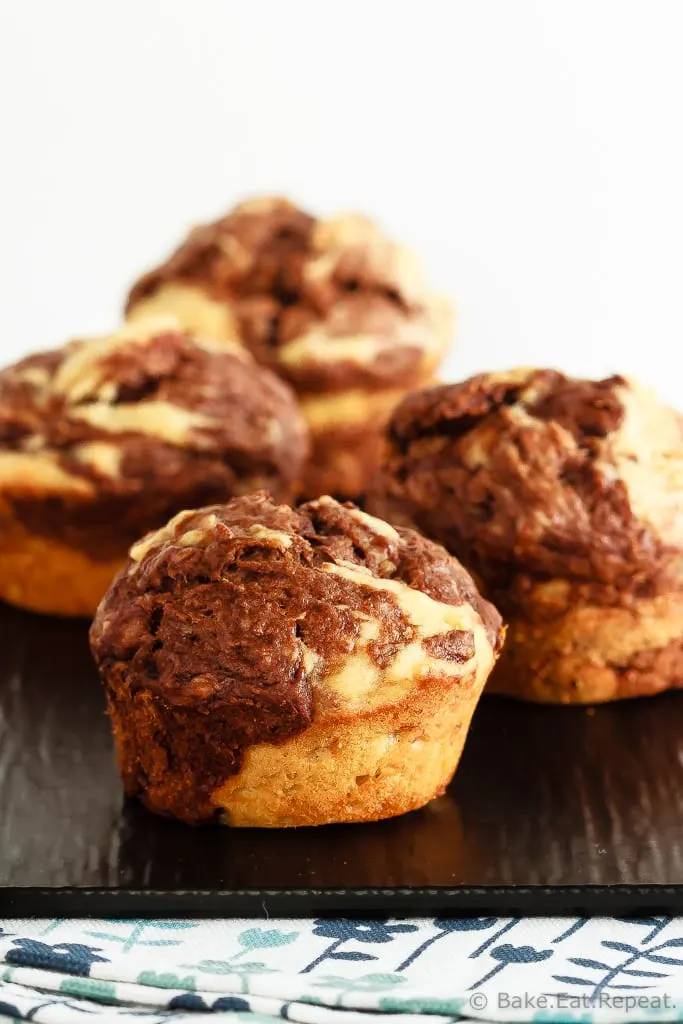 Marbled Chocolate Banana Muffins - These marbled chocolate banana muffins, made with minimal sugar and plain Greek yogurt to keep them a bit healthier, make the perfect breakfast or snack!