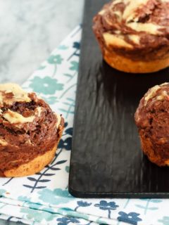 Marbled Chocolate Banana Muffins - These marbled chocolate banana muffins, made with minimal sugar and plain Greek yogurt to keep them a bit healthier, make the perfect breakfast or snack!