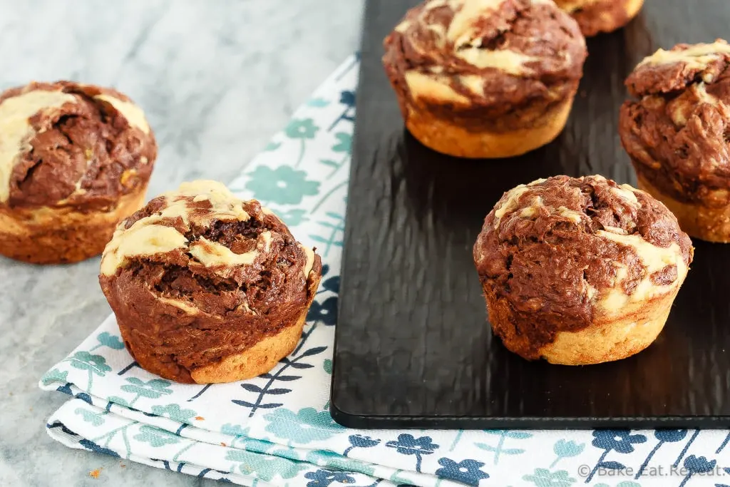 Marbled Chocolate Banana Muffins - These marbled chocolate banana muffins, made with minimal sugar and plain Greek yogurt to keep them a bit healthier, make the perfect breakfast or snack!