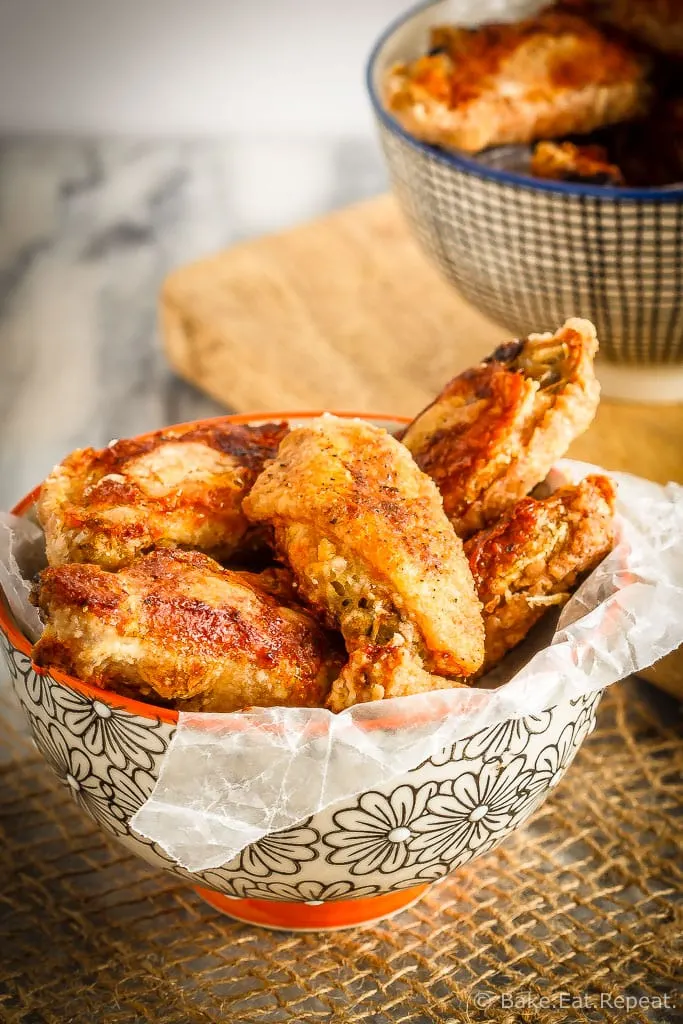 These oven baked wings are super crispy and so easy to make. Toss them with your favourite sauce for perfect wings that are baked instead of fried!