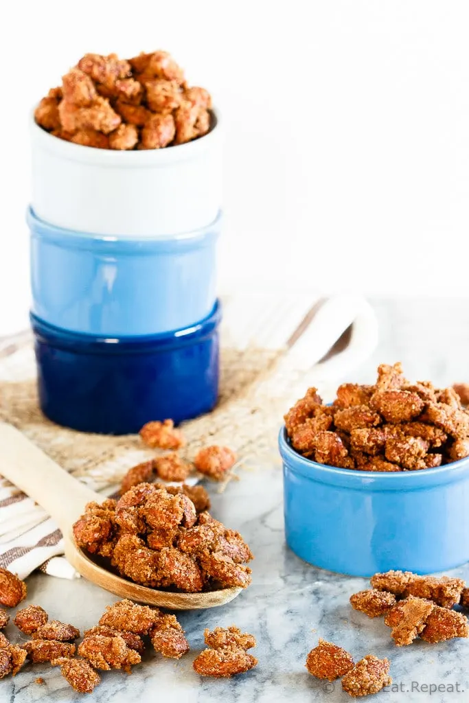 Cinnamon Sugar Almonds - Easy cinnamon sugar almonds. 5 minutes of prep time plus one hour of baking equals completely addictive, crunchy, candied almonds. The best kind of snack!