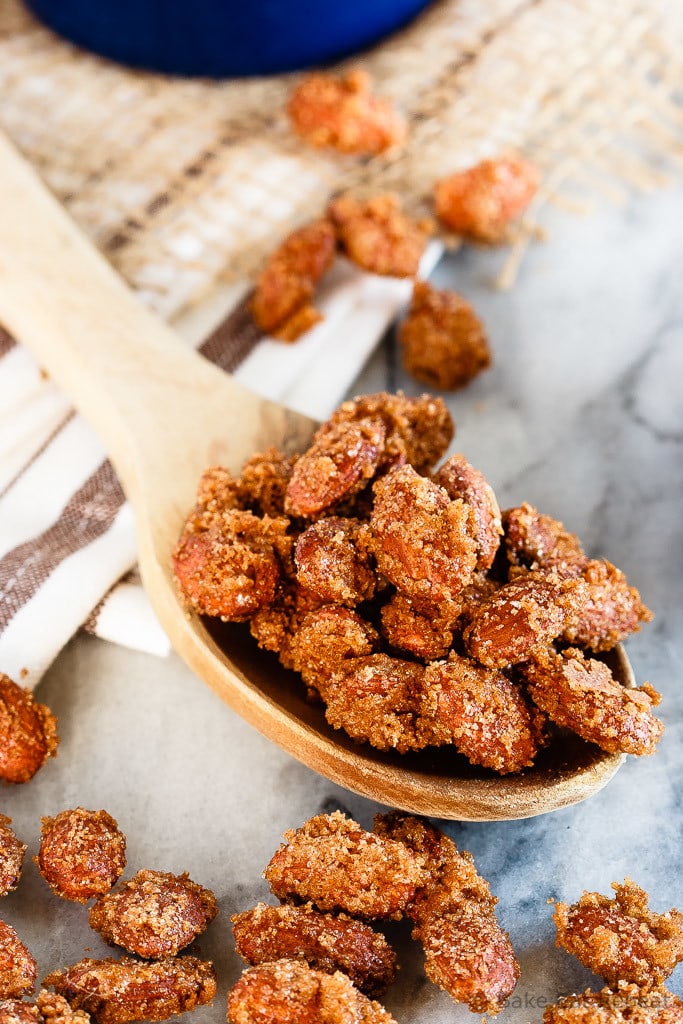 Cinnamon Sugar Almonds - Easy cinnamon sugar almonds. 5 minutes of prep time plus one hour of baking equals completely addictive, crunchy, candied almonds. The best kind of snack!