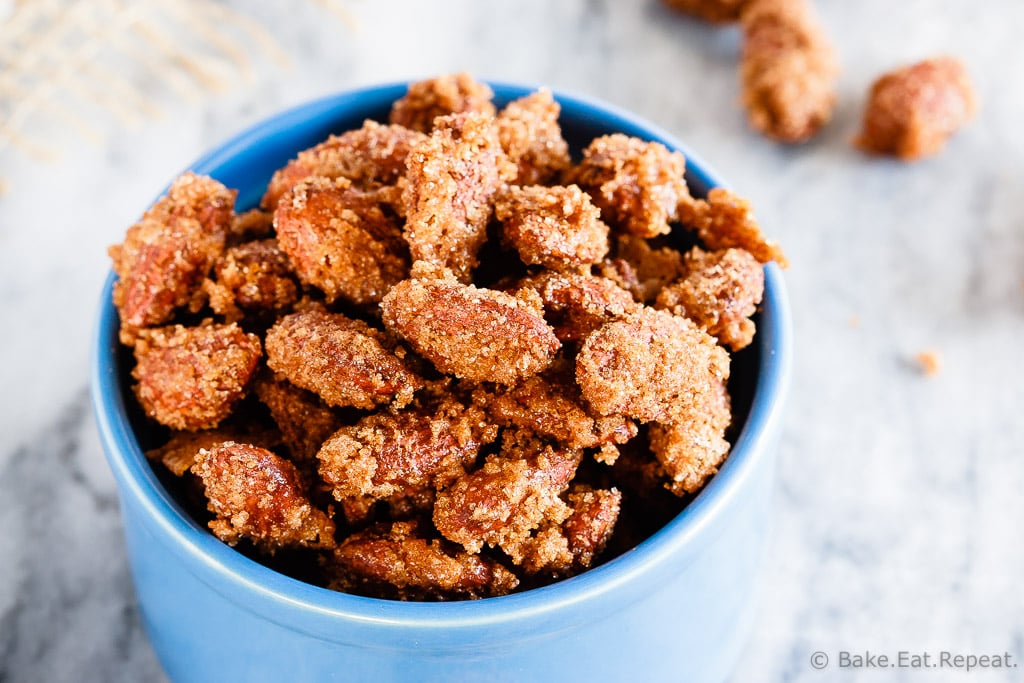 Cinnamon Sugar Almonds - Easy cinnamon sugar almonds. 5 minutes of prep time plus one hour of baking equals completely addictive, crunchy, candied almonds. The best kind of snack!