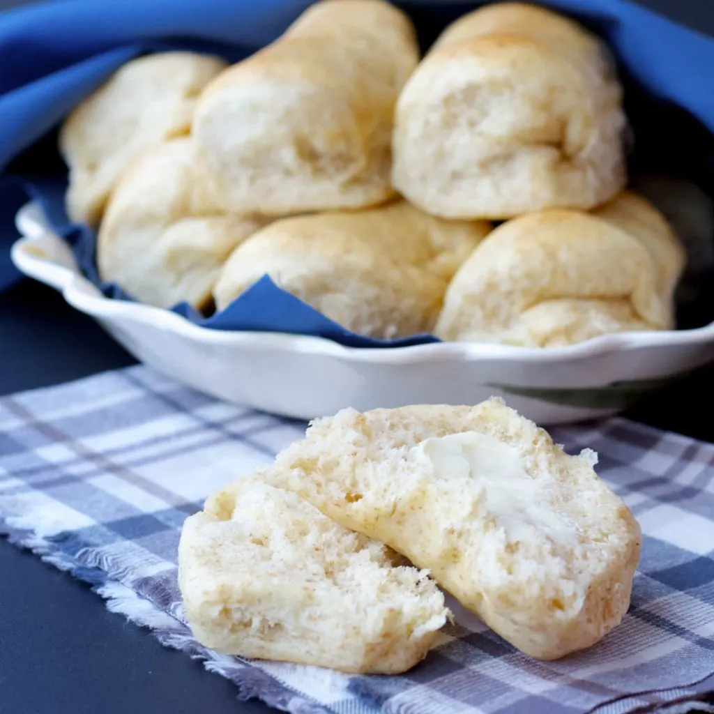 Whole Wheat and Honey Parker House Rolls - Bake.Eat.Repeat.