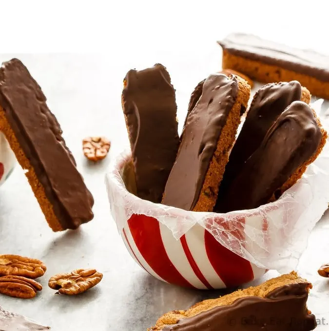 These easy to make pecan chocolate chip cookie dunkers are like biscotti - a crisp chocolate chip cookie that you can easily dunk in your milk or coffee!