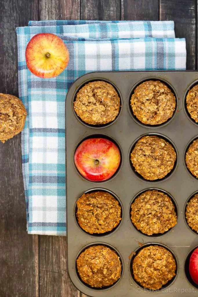 These apple cinnamon muffins are low in sugar and are made with no oil or butter. Filled with oats and apples they're hearty, delicious muffins that are healthy enough for breakfast. They also freeze well for easy grab and go snacks!