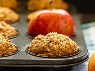 These apple cinnamon muffins are low in sugar and are made with no oil or butter. Filled with oats and apples they're hearty, delicious muffins that are healthy enough for breakfast. They also freeze well for easy grab and go snacks!