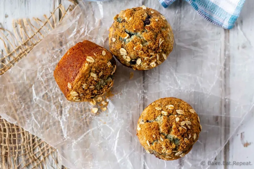 Enjoy a healthier blueberry muffin with these blueberry oatmeal muffins - filled with oats and blueberries, and less oil and sugar then your typical muffin!