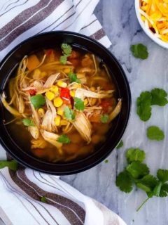 Instant Pot or slow cooker chicken taco soup - the easiest soup to toss together, and so full of flavour. The whole family will love it!