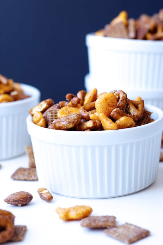 Sweet and Spicy Snack Mix - This snack mix is quick and easy to mix up, with an addictive sweet and spicy coating. Perfect to pack in a lunch, or just eat up straight off the pan!