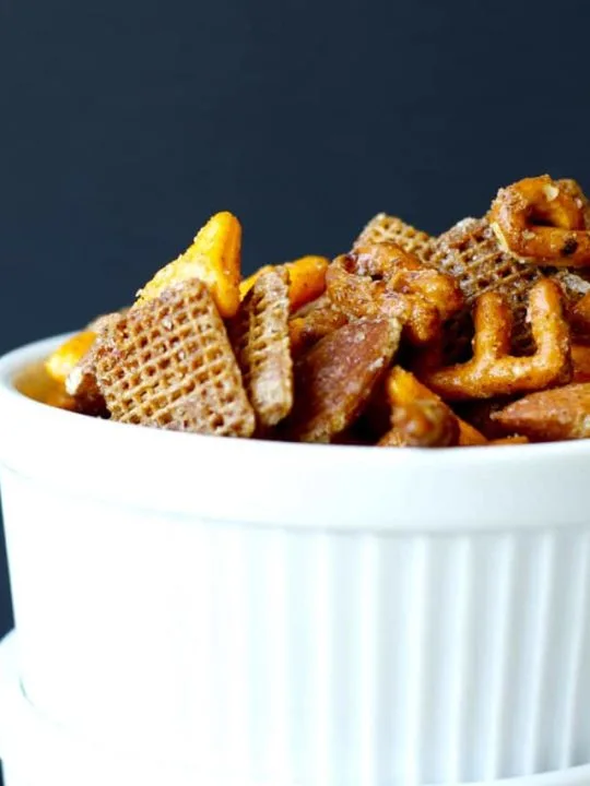 Sweet and Spicy Snack Mix - This snack mix is quick and easy to mix up, with an addictive sweet and spicy coating. Perfect to pack in a lunch, or just eat up straight off the pan!