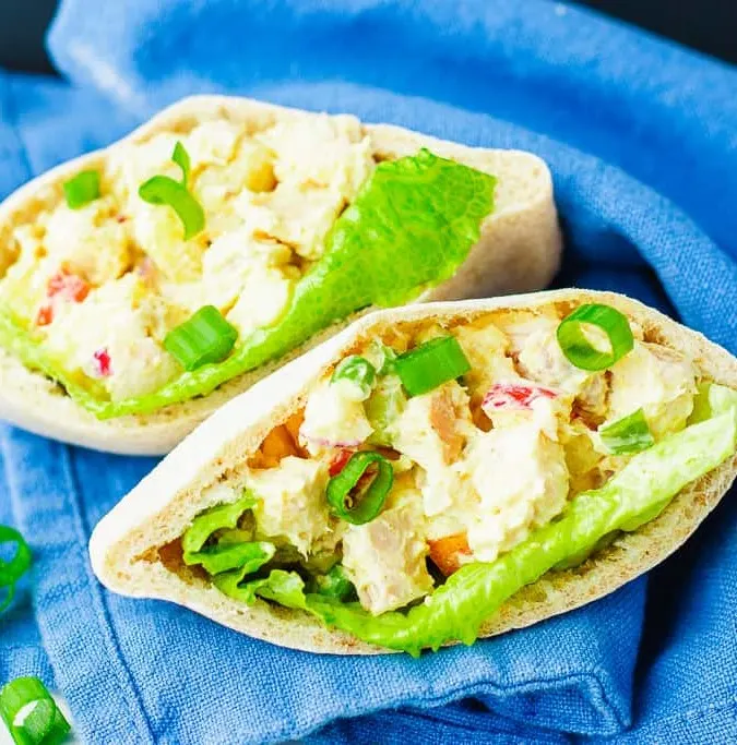 Curried Chicken Salad - This curried chicken salad is fast and easy to make, and makes a great lunch. It's also lightened up with Greek yogurt so it's healthy as well as delicious!