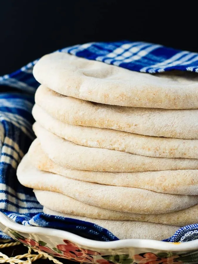 Whole Wheat Pita Bread - Homemade pita bread that is quick and easy and absolutely delicious! You'll never want to buy pita bread at the store again!