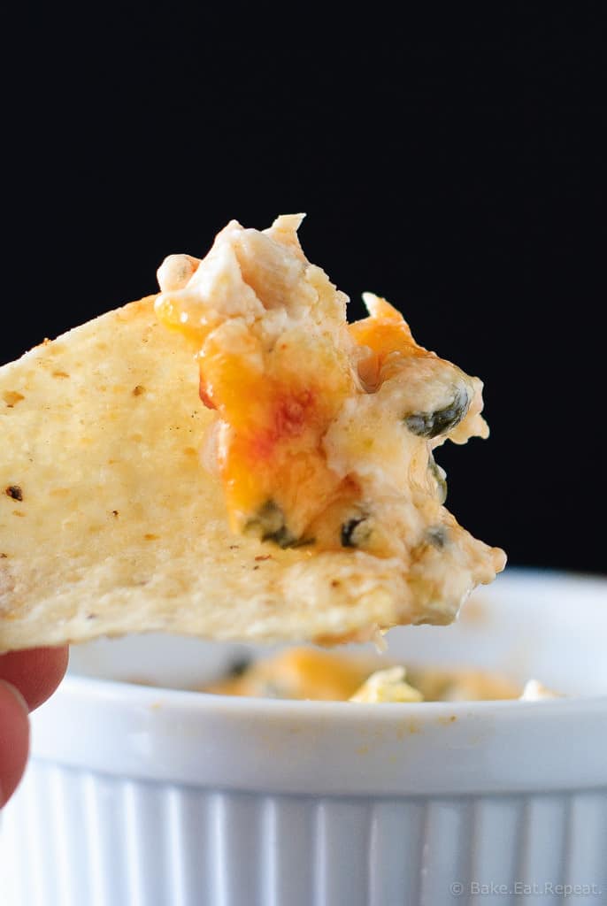 Hot Crab, Spinach and Artichoke Dip - Easy hot baked crab, spinach and artichoke dip that you will not be able to stop eating! Having a party? Or a Friday night? You need this cheesy dip!