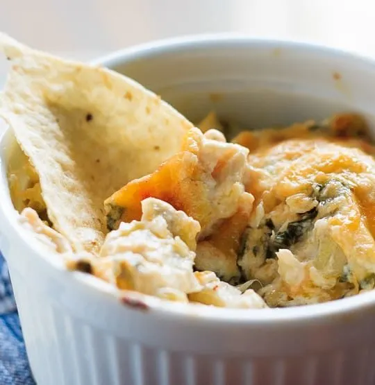Hot Crab, Spinach and Artichoke Dip - Easy hot baked crab, spinach and artichoke dip that you will not be able to stop eating! Having a party? Or a Friday night? You need this cheesy dip!