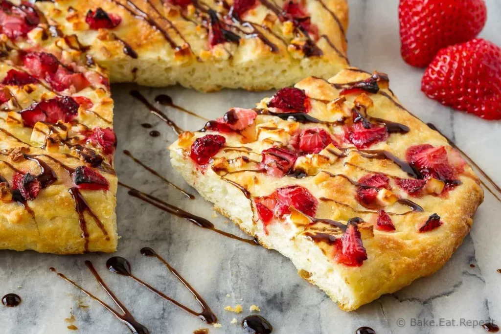 This easy focaccia with strawberries and feta is topped with balsamic glaze and makes the perfect side dish or light lunch. And the kids went crazy for it!