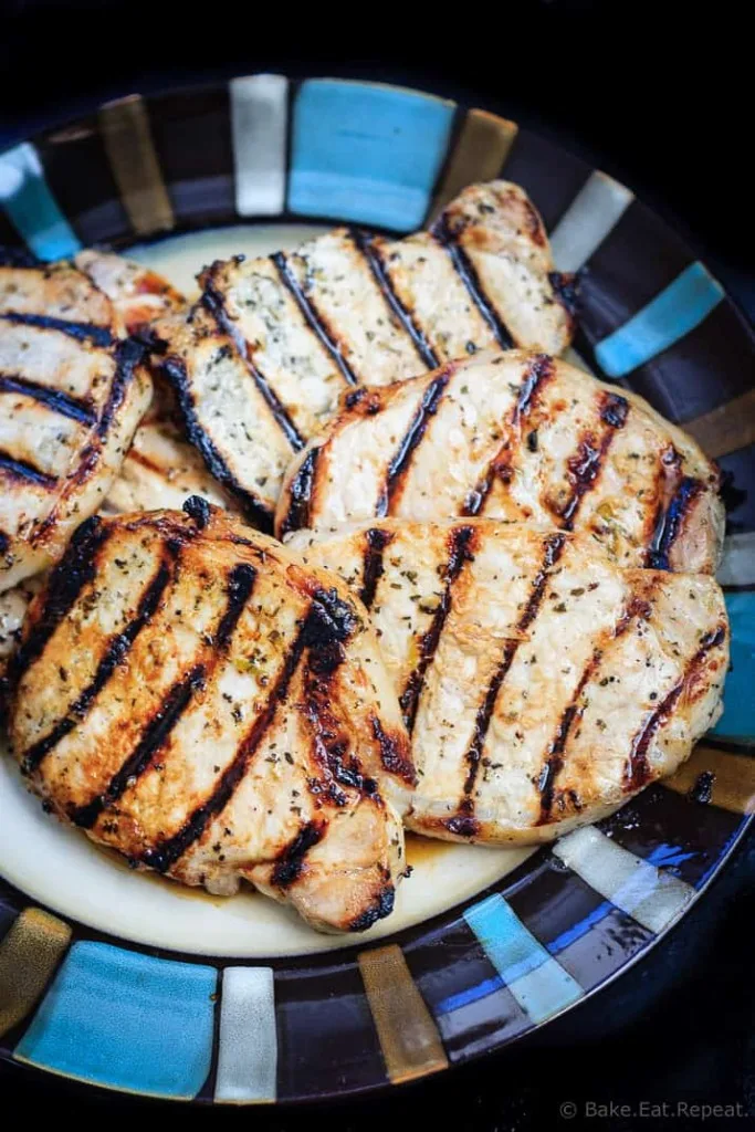 Honey Lime Grilled Pork Chops - Tender and juicy honey lime marinated pork chops that are quick and easy to grill up for the perfect summer meal!