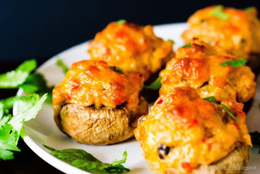 Cheesy Taco Stuffed Mushrooms - Easy to make cheesy taco stuffed mushrooms, a perfect appetizer. Plus they freeze well and can be made ahead of time!