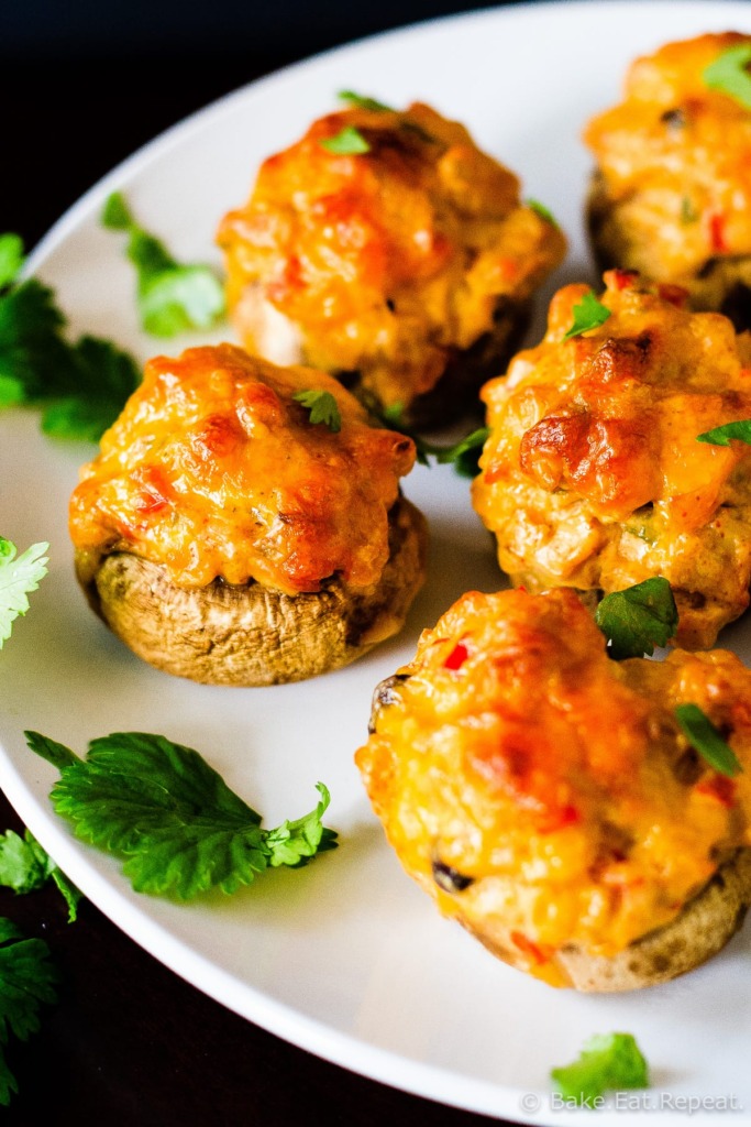 Cheesy Taco Stuffed Mushrooms - Easy to make cheesy taco stuffed mushrooms, a perfect appetizer. Plus they freeze well and can be made ahead of time!