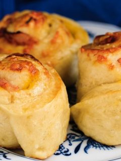 Ham and Cheddar Pretzel Rolls - Soft and fluffy pretzel rolls filled with ham and cheddar cheese - the perfect on the go meal or snack!