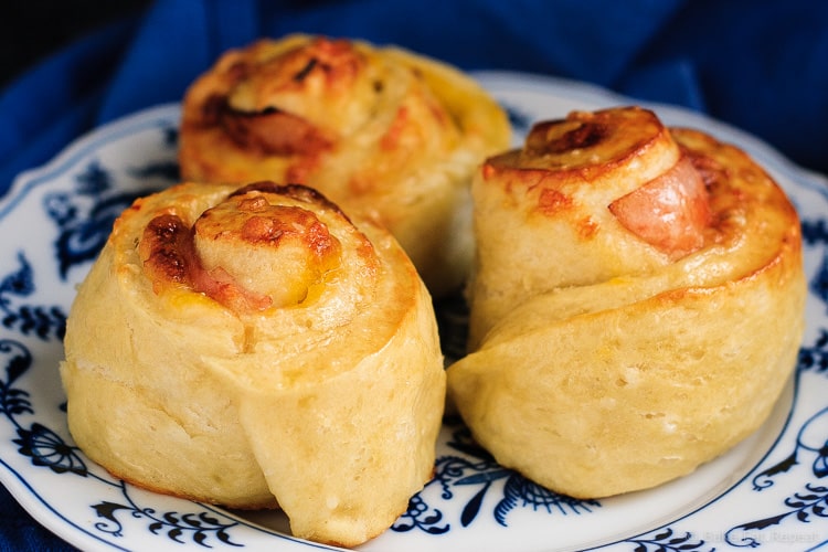 Ham and Cheddar Pretzel Rolls - Soft and fluffy pretzel rolls filled with ham and cheddar cheese - the perfect on the go meal or snack!