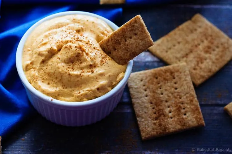 Pumpkin Pie Dip - A quick and easy pumpkin pie dip that tastes just like pumpkin pie, but in dip form! Serve it with graham crackers and fruit for a perfect light dessert!