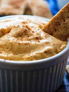 Pumpkin Pie Dip - A quick and easy pumpkin pie dip that tastes just like pumpkin pie, but in dip form! Serve it with graham crackers and fruit for a perfect light dessert!