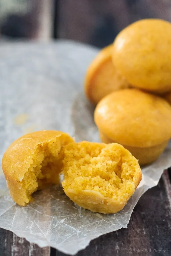 Baked Pumpkin Spice Doughnuts - Quick and easy baked pumpkin spice doughnuts (or doughnut holes!) coated with either a sweet maple glaze or cinnamon sugar. Either way - they're absolutely amazing!