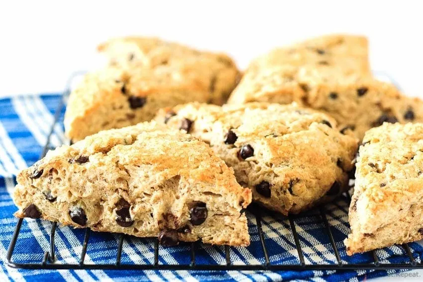 Chocolate Chip Scones - Flaky, tender, filled with chocolate chips and topped with coarse sugar - these scones make the perfect treat with your morning coffee!