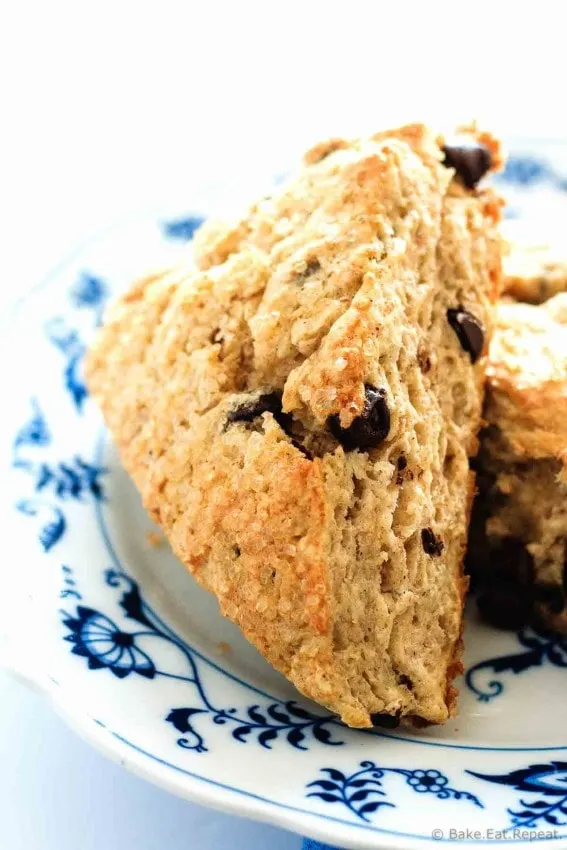 Chocolate Chip Scones - Flaky, tender, filled with chocolate chips and topped with coarse sugar - these scones make the perfect treat with your morning coffee!