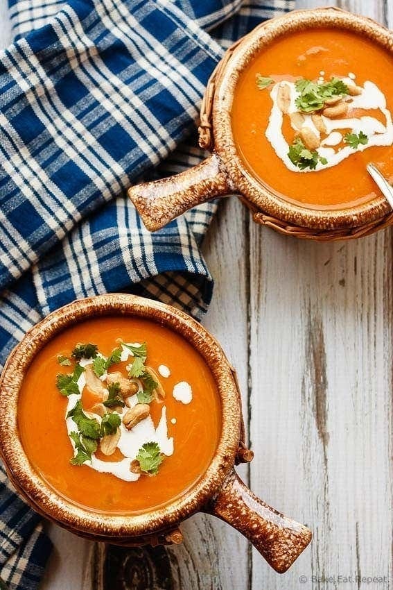 Slow Cooker Thai Pumpkin Soup - Easy to make slow cooker Thai pumpkin soup - a bit spicy, a bit creamy, a whole lot of amazing. The perfect meal for a cold fall day!