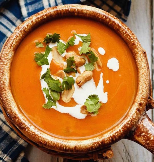 This easy to make, slow cooker Thai pumpkin soup is a bit spicy, a bit creamy, and absolutely amazing. The perfect meal for a cold fall day!