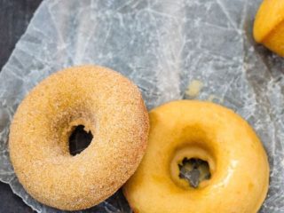 Baked Pumpkin Spice Doughnuts - Quick and easy baked pumpkin spice doughnuts (or doughnut holes!) coated with either a sweet maple glaze or cinnamon sugar. Either way - they're absolutely amazing!