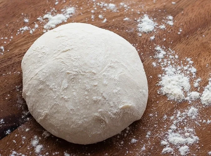 Perfect Thin Crust Pizza Dough - The best pizza dough. Cold rise, thin crust, crispy, perfect pizza. You will never need another pizza dough recipe.