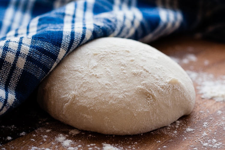 Perfect Thin Crust Pizza Dough - The best pizza dough. Cold rise, thin crust, crispy, perfect pizza. You will never need another pizza dough recipe.