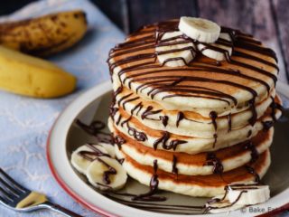 Banana Pancakes - Easy banana pancakes that mix up quickly and are a fantastic change from the usual buttermilk pancakes. The whole family will love these for breakfast!