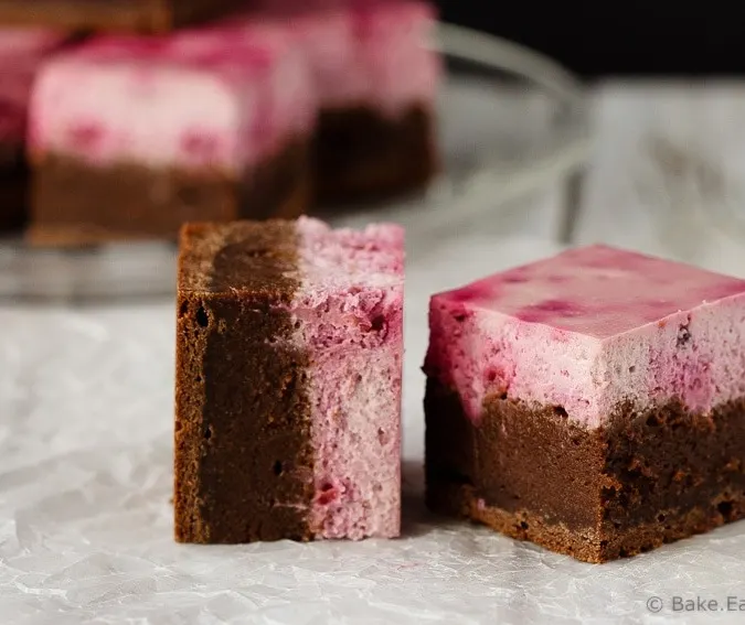 Raspberry Cheesecake Brownies - Easy to make raspberry cheesecake brownies that are perfect for Valentine’s Day! Or for a special dessert. Or just because. These are amazing!