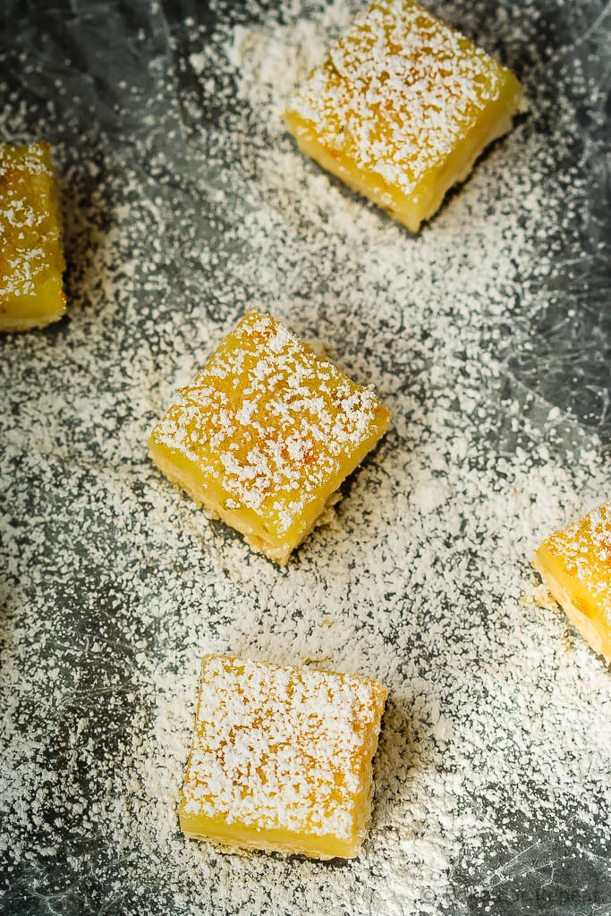 Lemon Lime Bars - Tart, sweet, amazing lemon lime bars with a crisp shortbread crust - the perfect dessert that everyone will love!