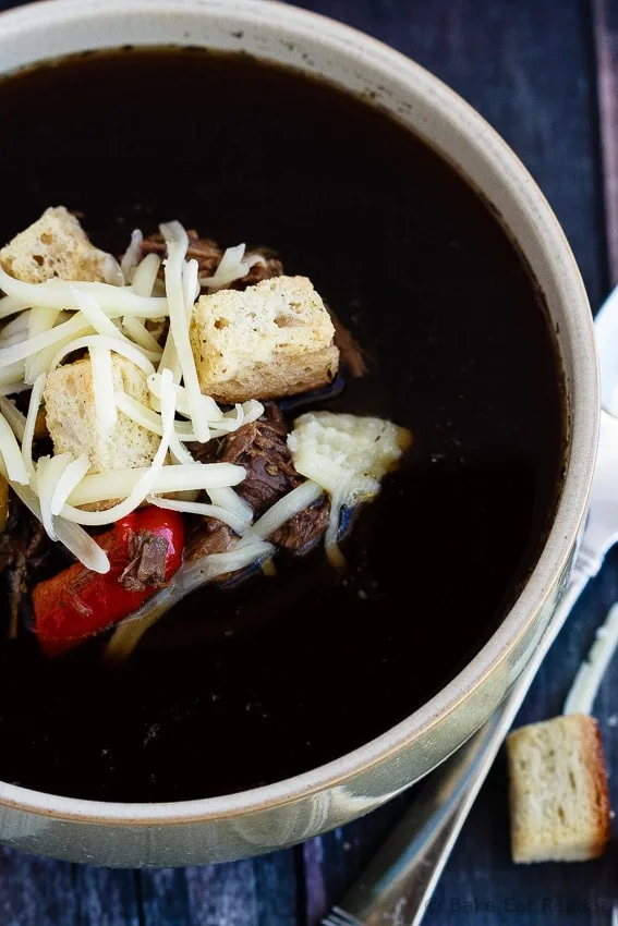 Philly Cheesesteak Soup - Easy Philly cheesesteak soup with shredded beef, caramelized onions and peppers, and garnished with croutons and cheese - it's the sandwich you love in soup form!