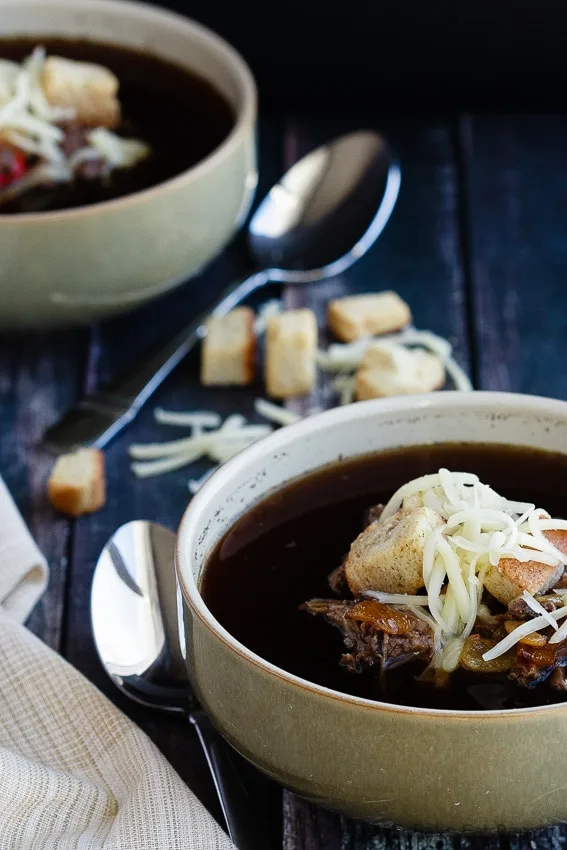 Philly Cheesesteak Soup - Easy Philly cheesesteak soup - shredded beef, caramelized onions and peppers, garnished with croutons and cheese - the sandwich you love in soup form!