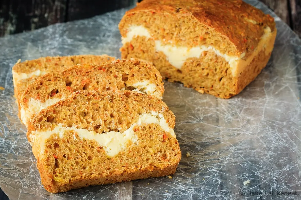Cream Cheese Filled Carrot Bread - A healthier carrot bread filled with a cream cheese ribbon - healthy enough for breakfast but enough like carrot cake to feel like a treat!