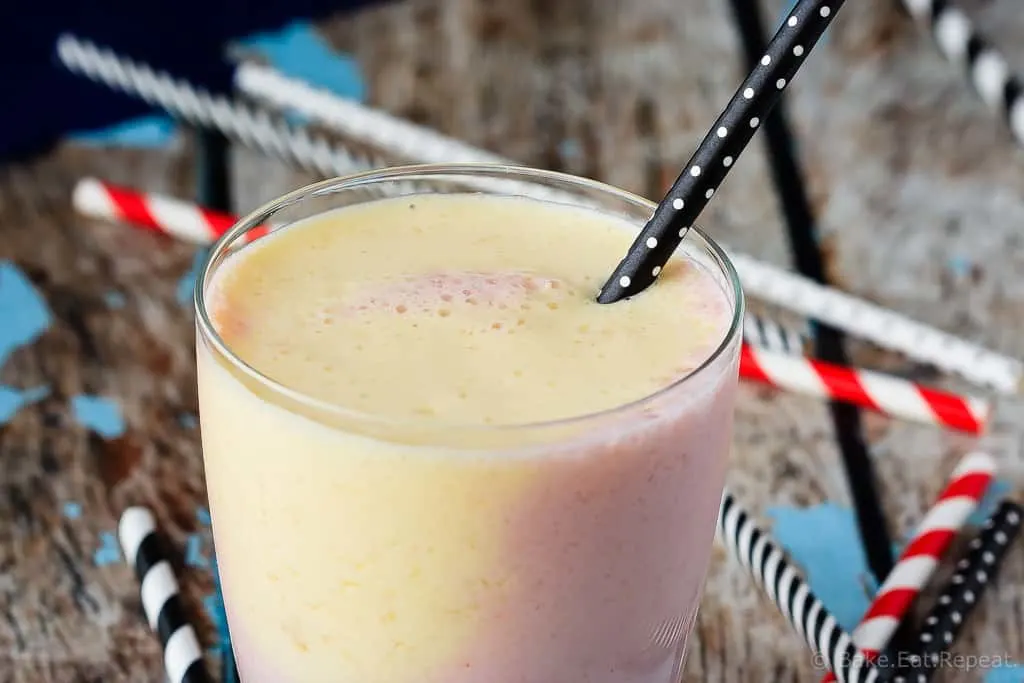 Pineapple Strawberry Smoothie - The perfect quick breakfast or snack, this pineapple strawberry smoothie healthy, tasty and filling - and so pretty with it's swirly layers!